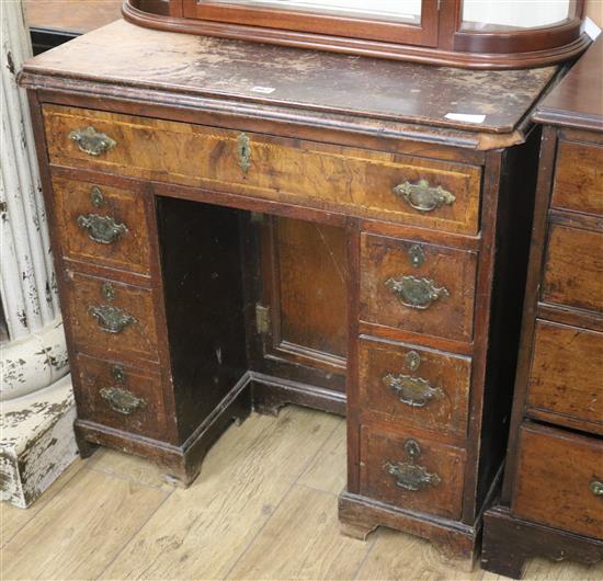 A mid 18th century walnut kneehole desk W.81cm.